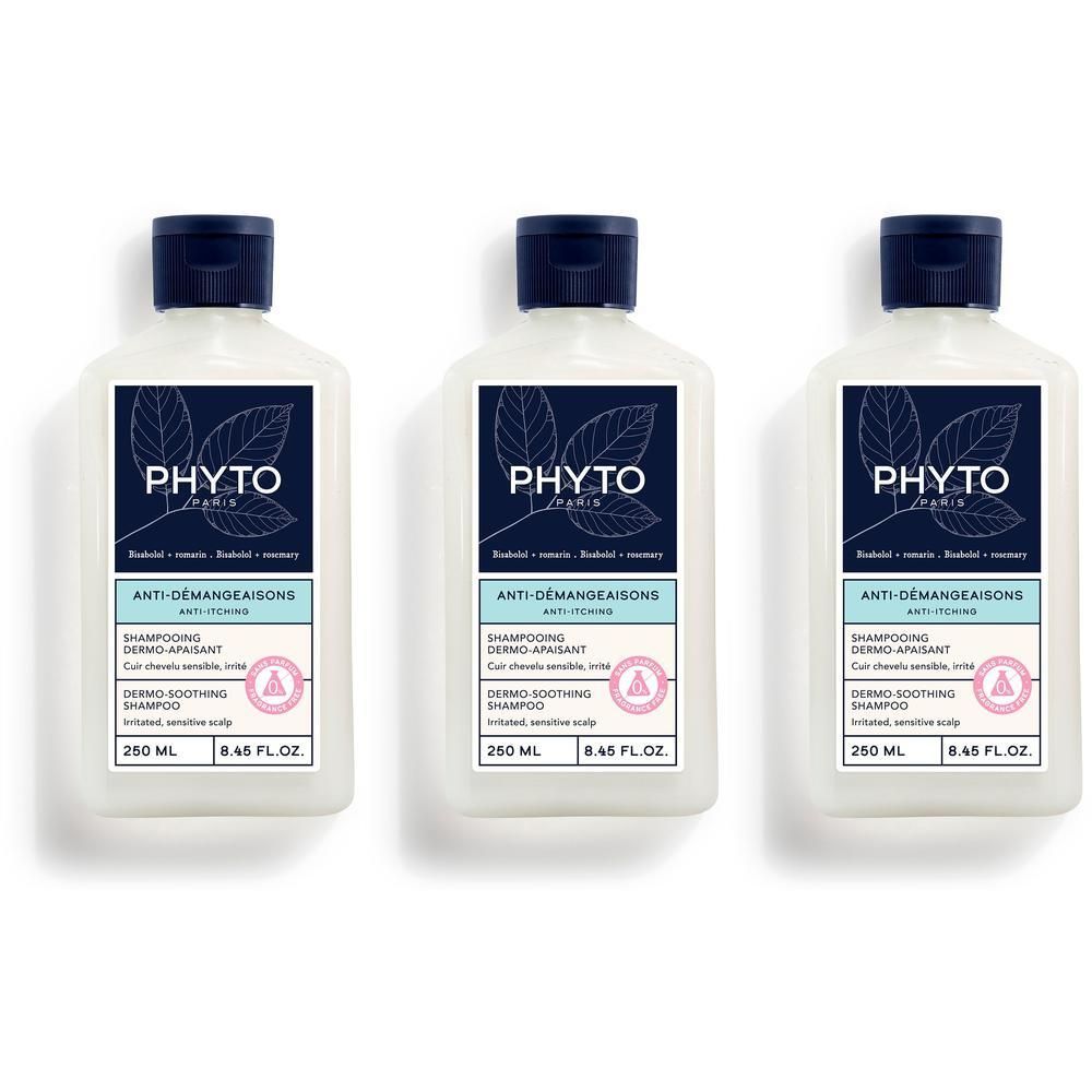 Drie flessen Phyto Anti-Démangeaisons shampoo. Witte flessen met blauwe doppen en etiketten. Tekst: Anti-jeuk, Dermo-verzachtend.