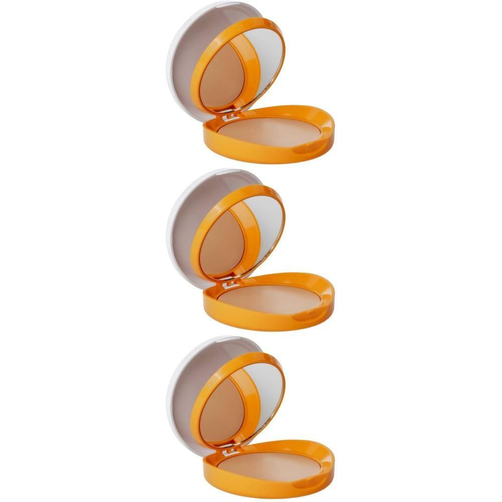 Trois poudres compactes rondes, orange, avec miroirs. Les couvercles blancs sont ouverts.