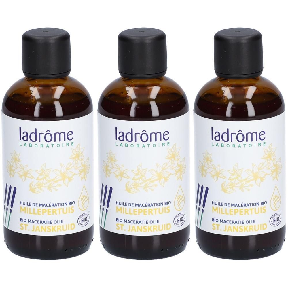 Drie bruine glazen flessen met zwarte dop. Etiket met productnaam en logo. Bio-certificering.