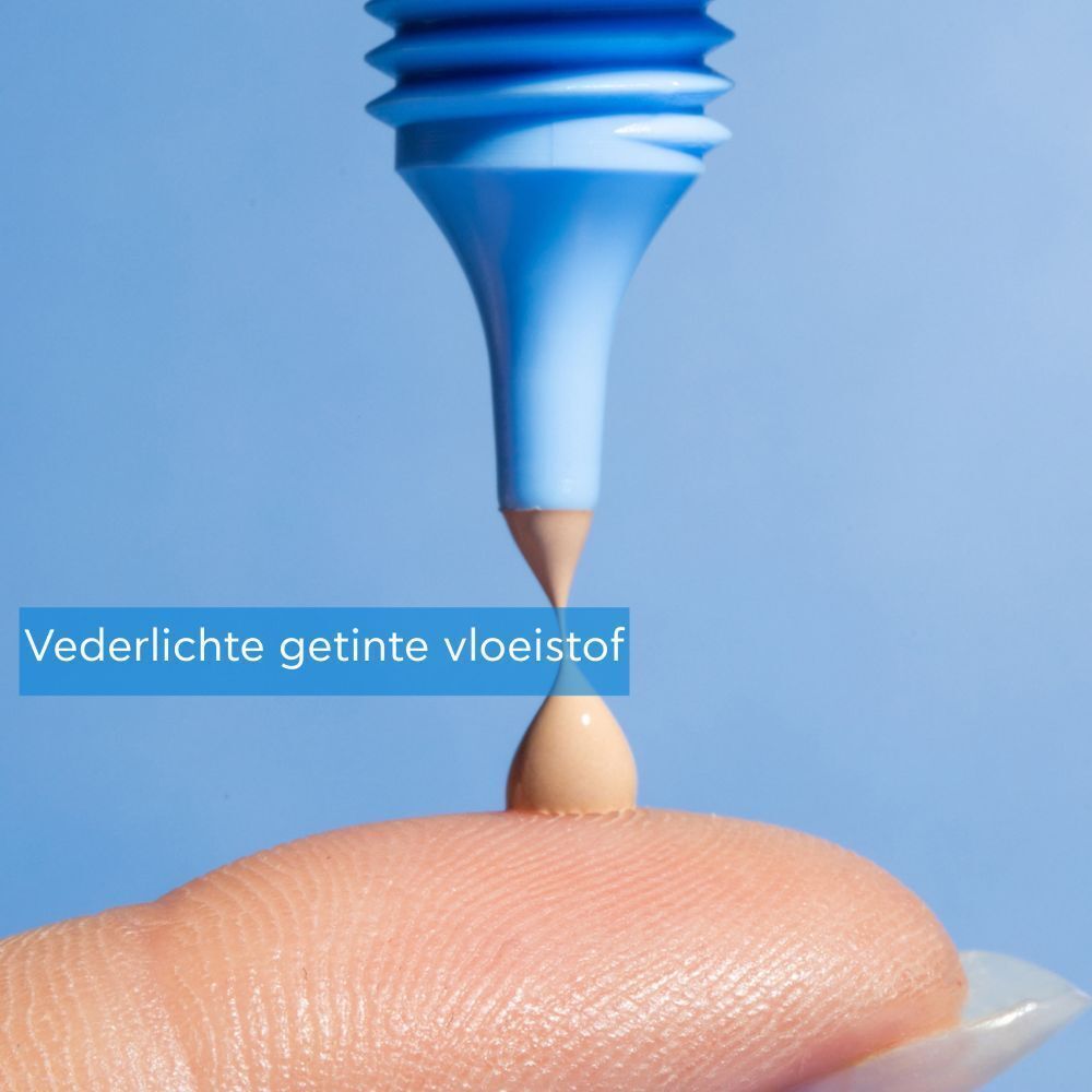 Product wordt uit de tube geperst. Opschrift: Aqua Beelicious. Tekst: Vederlichte getinte vloeistof. Tint.