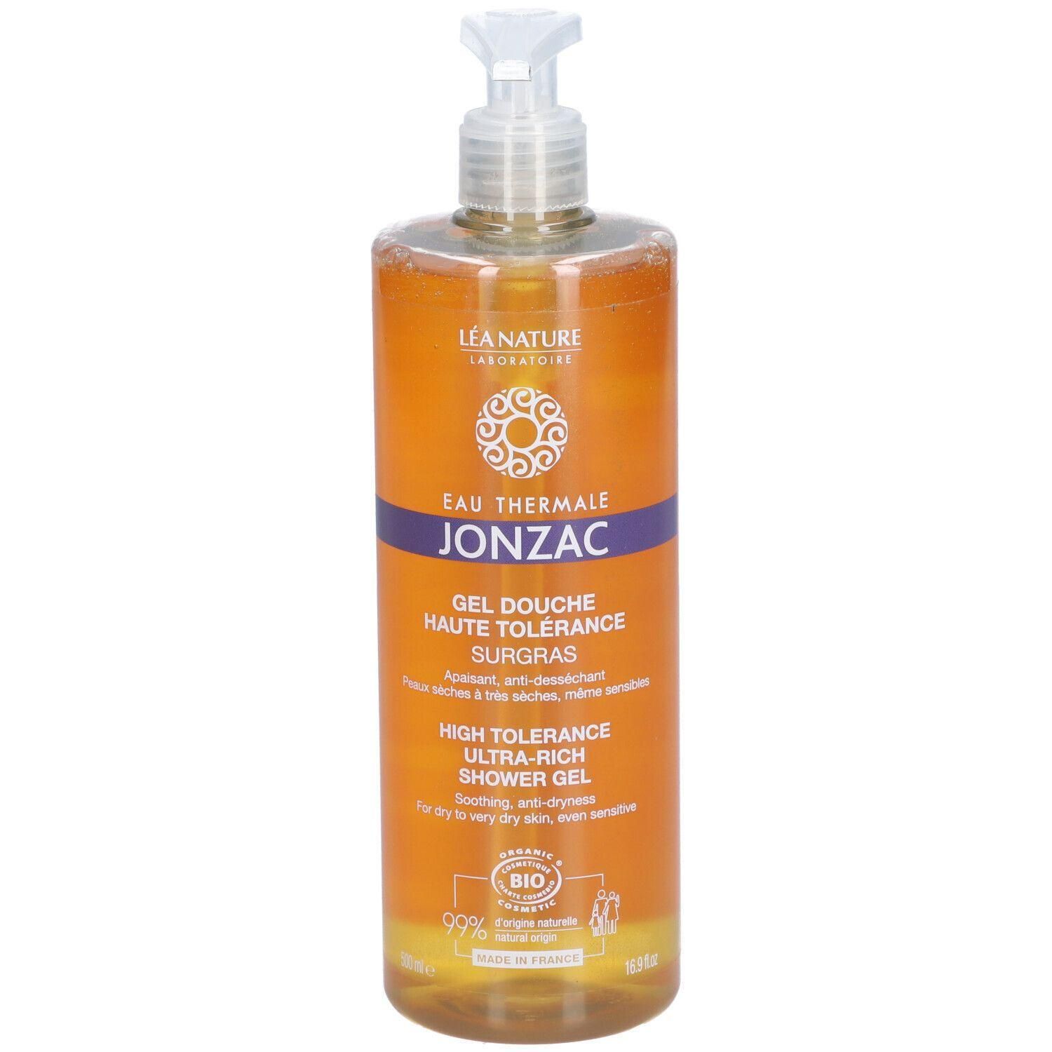 Oranje douchegel fles met witte pomp. Tekst: JONZAC, HAUTE TOLERANCE, ULTRA-RICH SHOWER GEL. Bio-keurmerk.