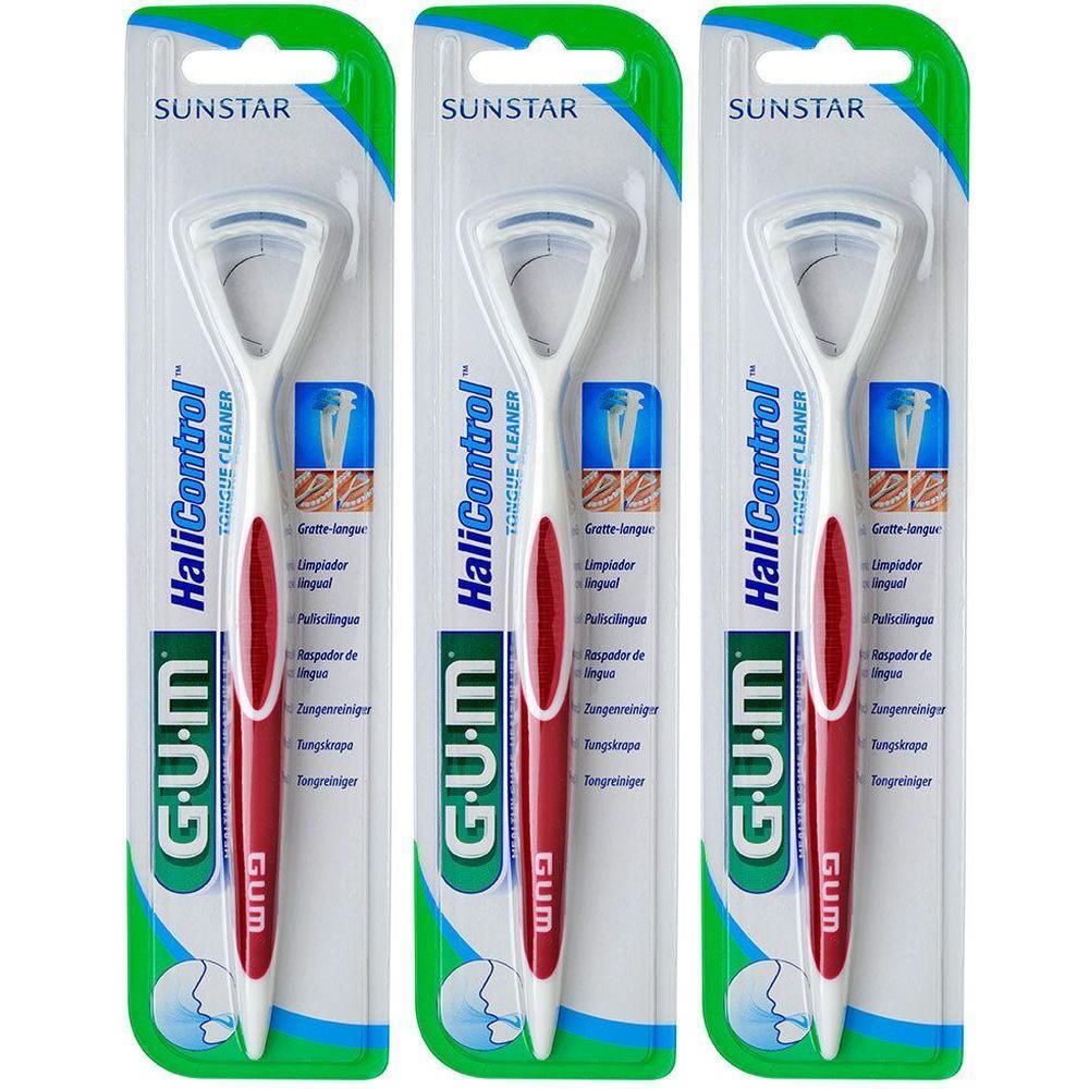 Trois nettoyeurs de langue G.U.M HaliControl emballés. Manche blanc et rouge, nettoyeur blanc. Marque Sunstar.