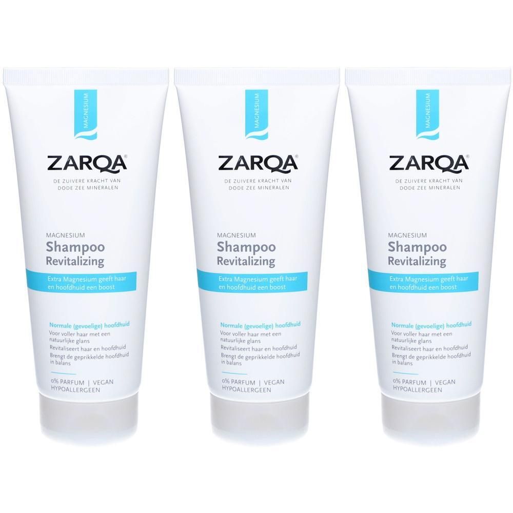 Trois tubes blancs avec étiquette bleue. Inscription: ZARQA, Shampooing Revitalisant au Magnésium. Vegan et hypoallergénique.