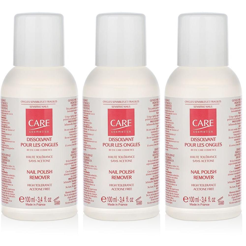 Trois flacons de dissolvant pour ongles. Bouteille blanche avec bouchon blanc. Étiquette rouge et blanche avec informations.