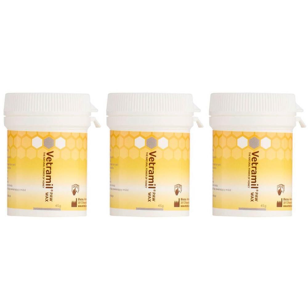 Trois pots blancs avec étiquette jaune. Inscription: Vetramil PAW WAX. Motif en nid d'abeille. Couvercles avec fermeture blanche.