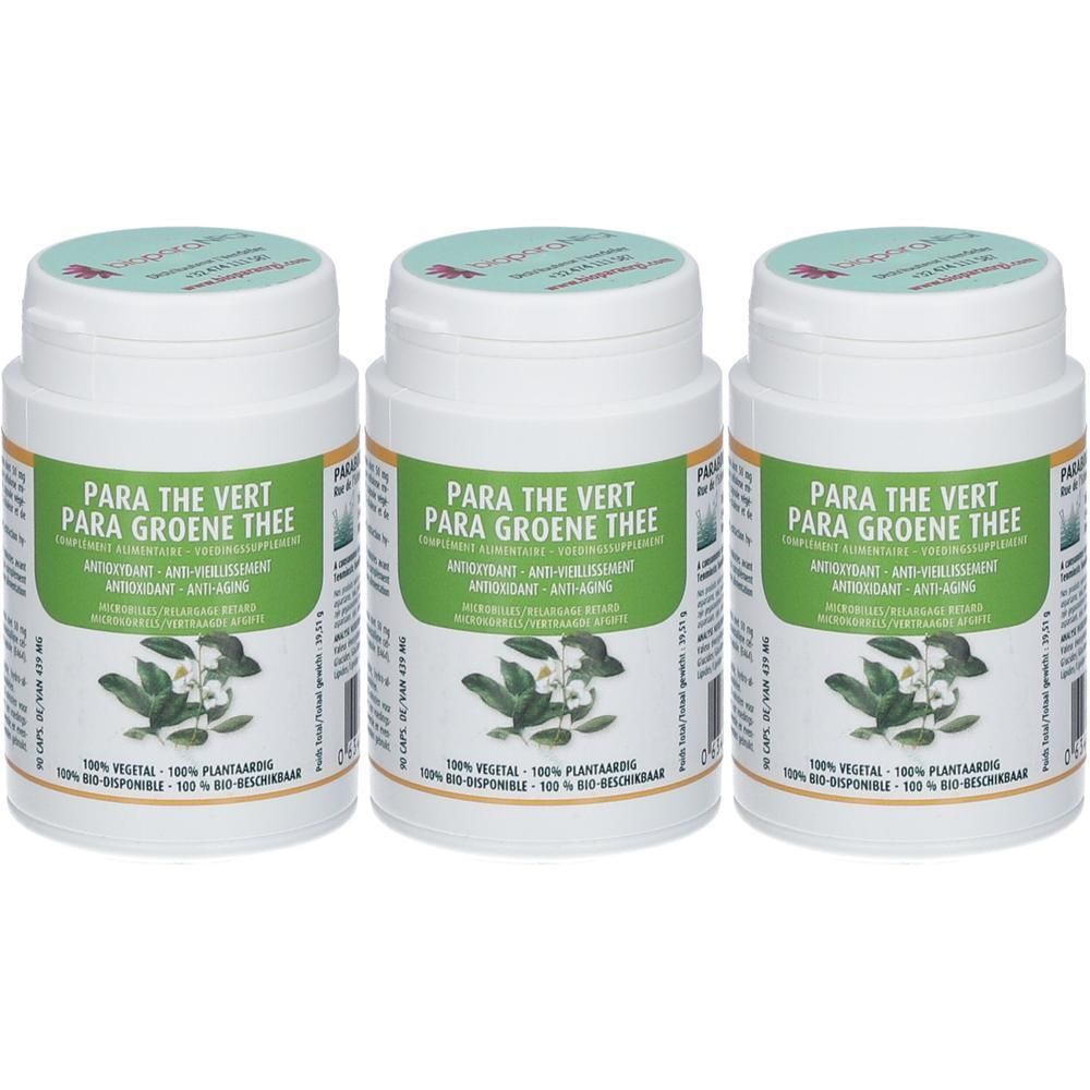 Drie witte potten met groene etiketten. Opschrift: Para Thé Vert, antioxidant. Afbeelding van bladeren en bloemen.