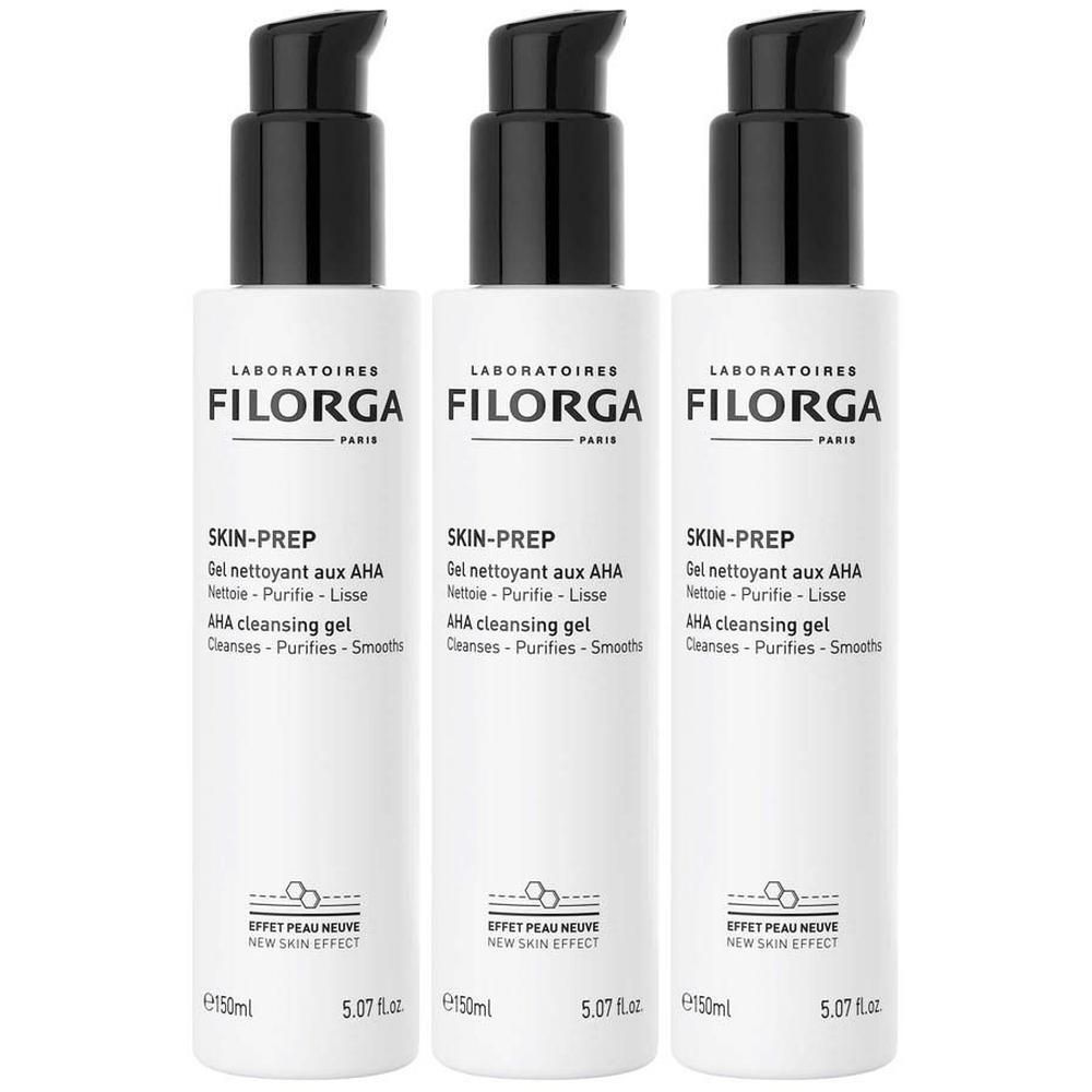 Drie witte flessen met zwarte pomp. Tekst: "FILORGA SKIN-PREP Gel nettoyant aux AHA".