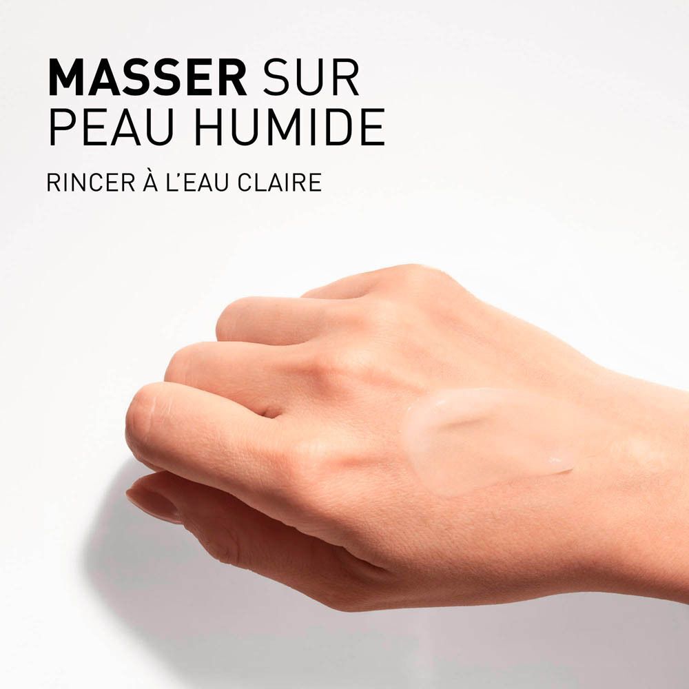 Main avec du gel. Texte: "MASSER SUR PEAU HUMIDE RINCER À L'EAU CLAIRE".