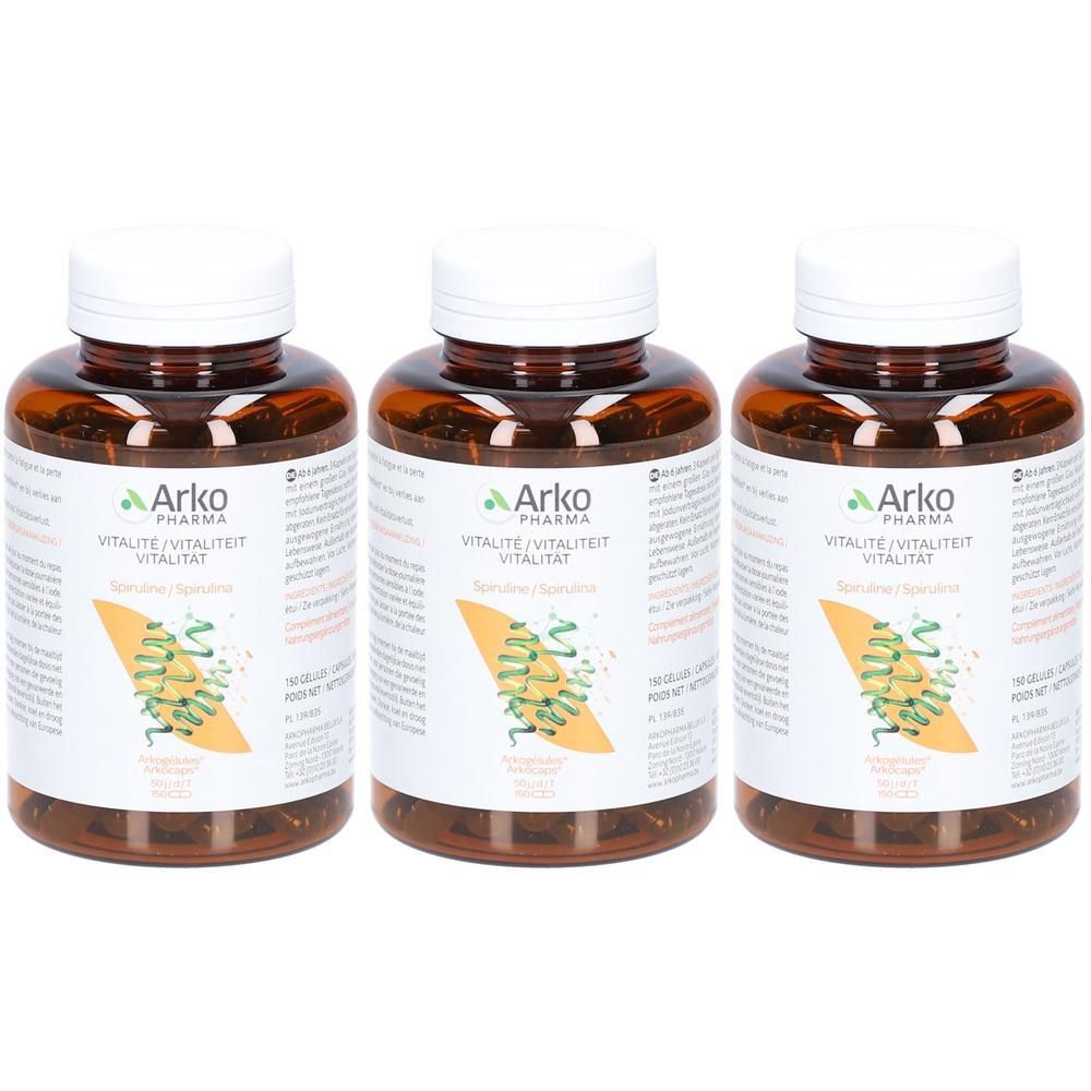 Drie bruine flessen met witte doppen. Labels: "Arko Pharma Vitalité Spirulina".