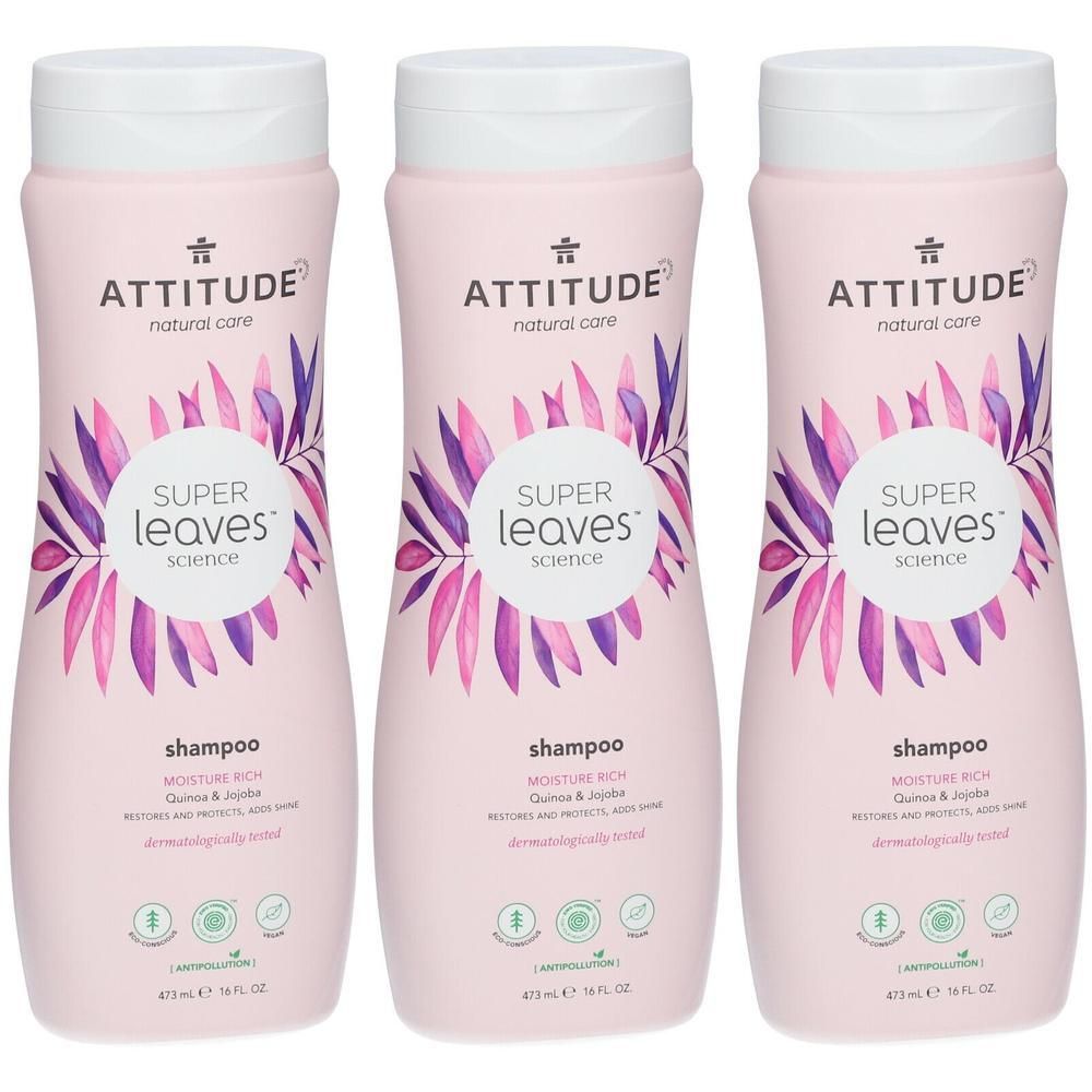Trois bouteilles de shampooing roses avec des bouchons blancs. Chaque bouteille porte l'inscription "ATTITUDE Super Leaves science shampoo".