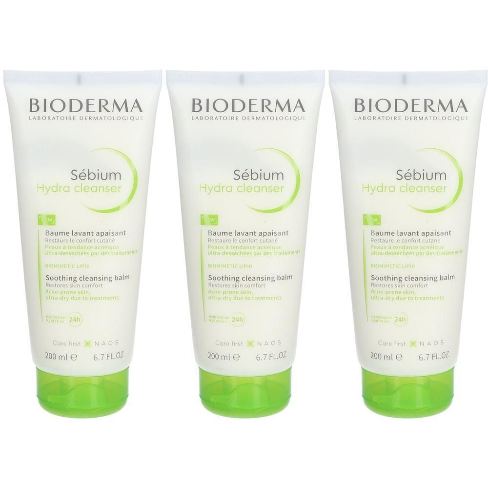 Drie tubes Bioderma Sébium Hydra cleanser. Witte tubes met groene accenten. Tekst: Sébium Hydra cleanser, Baume lavant apaisant.