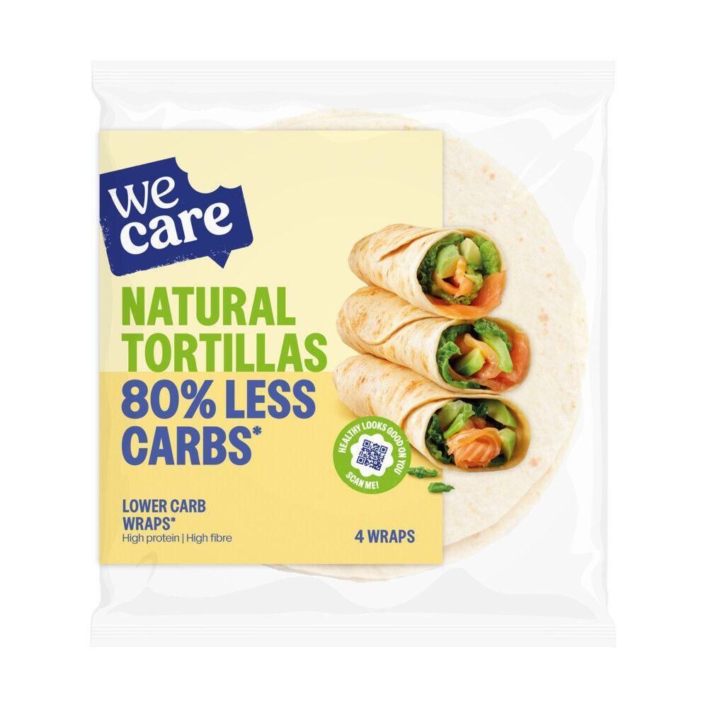 Paquet de tortillas. Inscription : We Care, Natural Tortillas, 80% moins de glucides. Contient 4 wraps. Quelques wraps sont garnis.