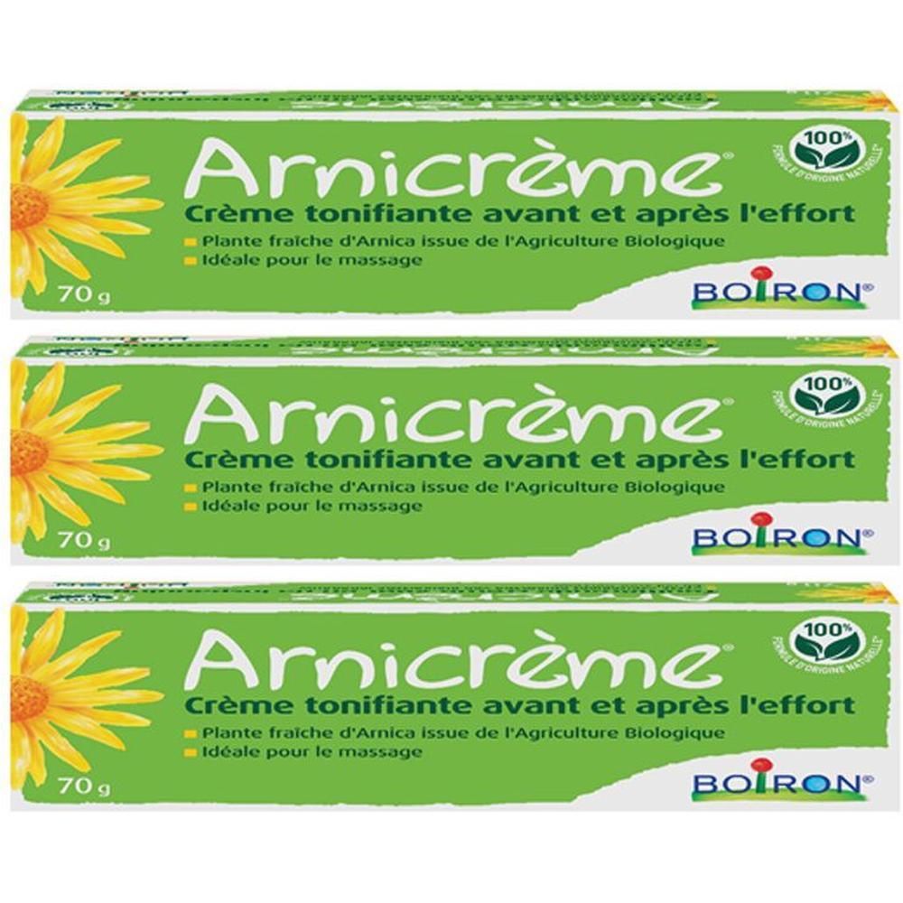Trois boîtes vertes "Arnicrème". Texte: Crème tonifiante avant et après l'effort. Logo Boiron et fleur jaune. 70g.