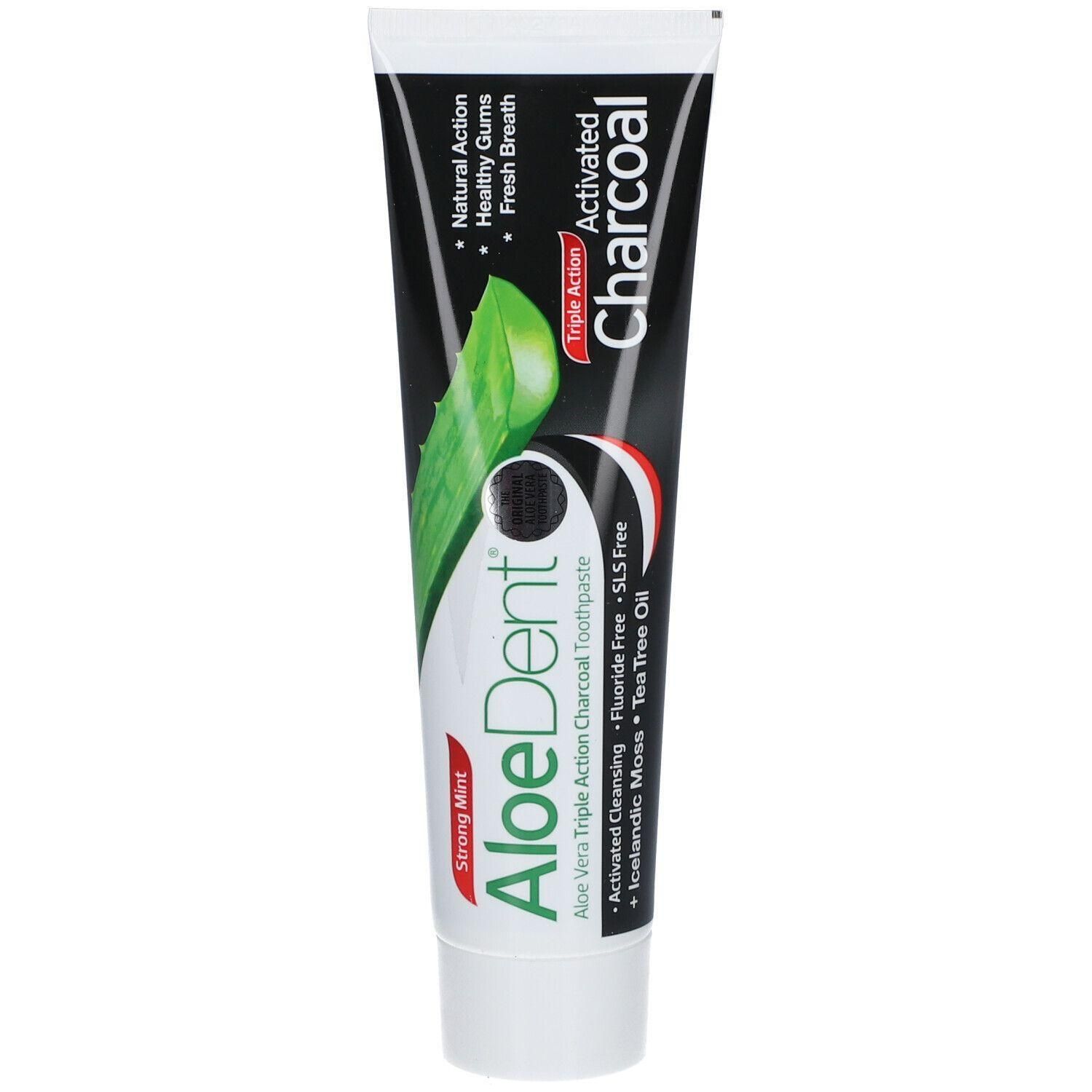 Tube de dentifrice avec bouchon blanc. Inscription: AloeDent Activated Charcoal. Contient de l'aloe vera, du charbon actif et d'autres ingrédients.