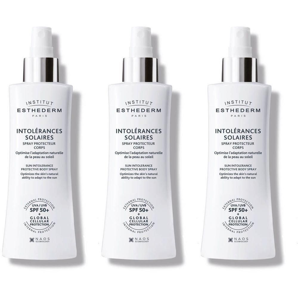 Drie flessen Institut Esthederm Intolérances Solaires Spray Protecteur Corps. Wit, met spraykop en tekst.