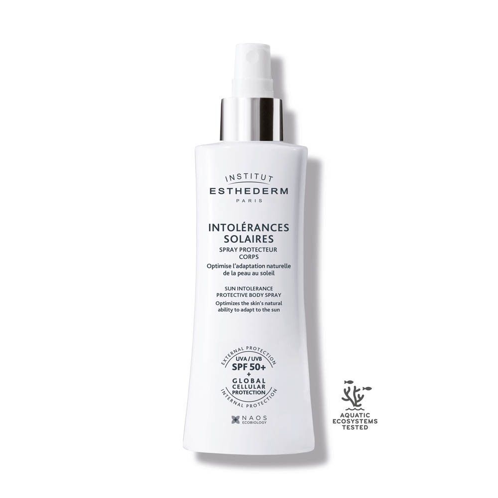 Un flacon Institut Esthederm Intolérances Solaires Spray Protecteur Corps. Blanc, avec vaporisateur et texte.