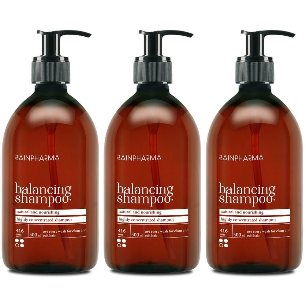 Trois flacons bruns avec pompes noires. Chaque flacon porte l'inscription "RainPharma balancing shampoo".