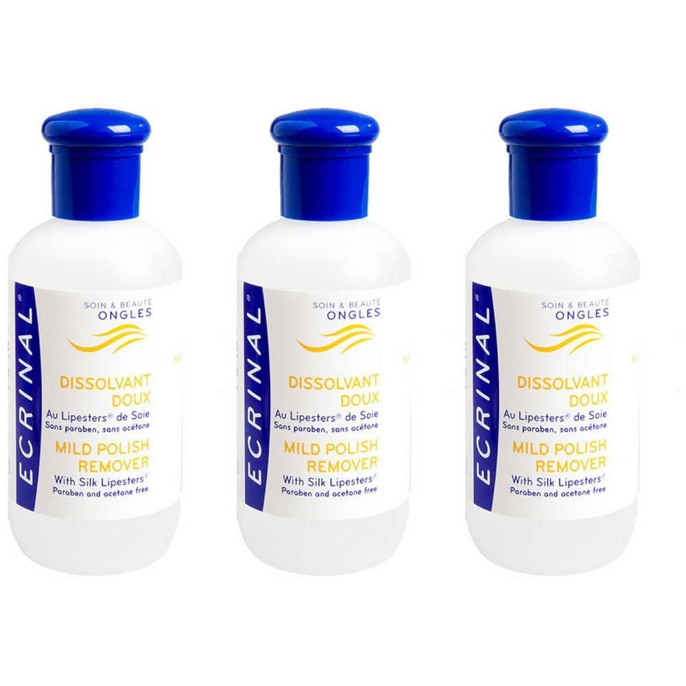 Drie flessen Ecrinal nagellakverwijderaar. Witte flessen met blauwe dop. Tekst: Dissolvant Doux, Mild Polish Remover.