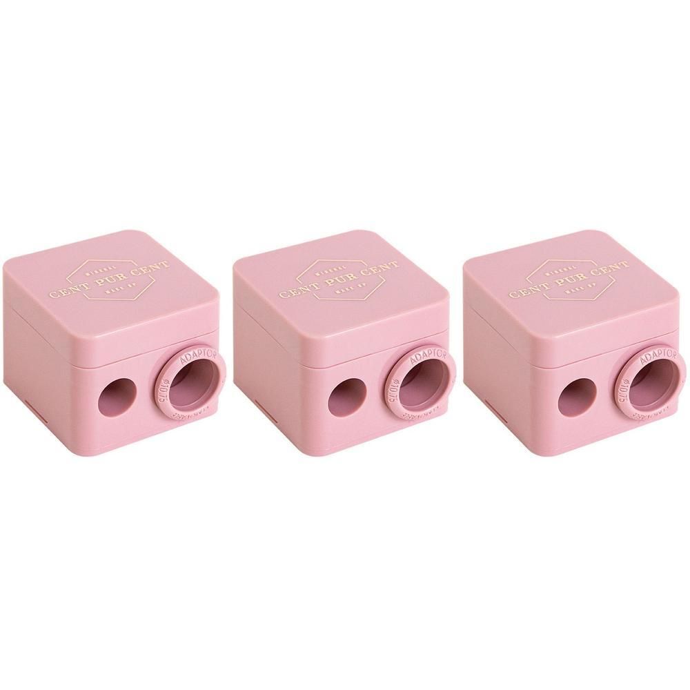 Drie roze puntenslijpers. Vierkante vorm met twee gaten en een adapter. Opschrift: Cent Pur Cent.