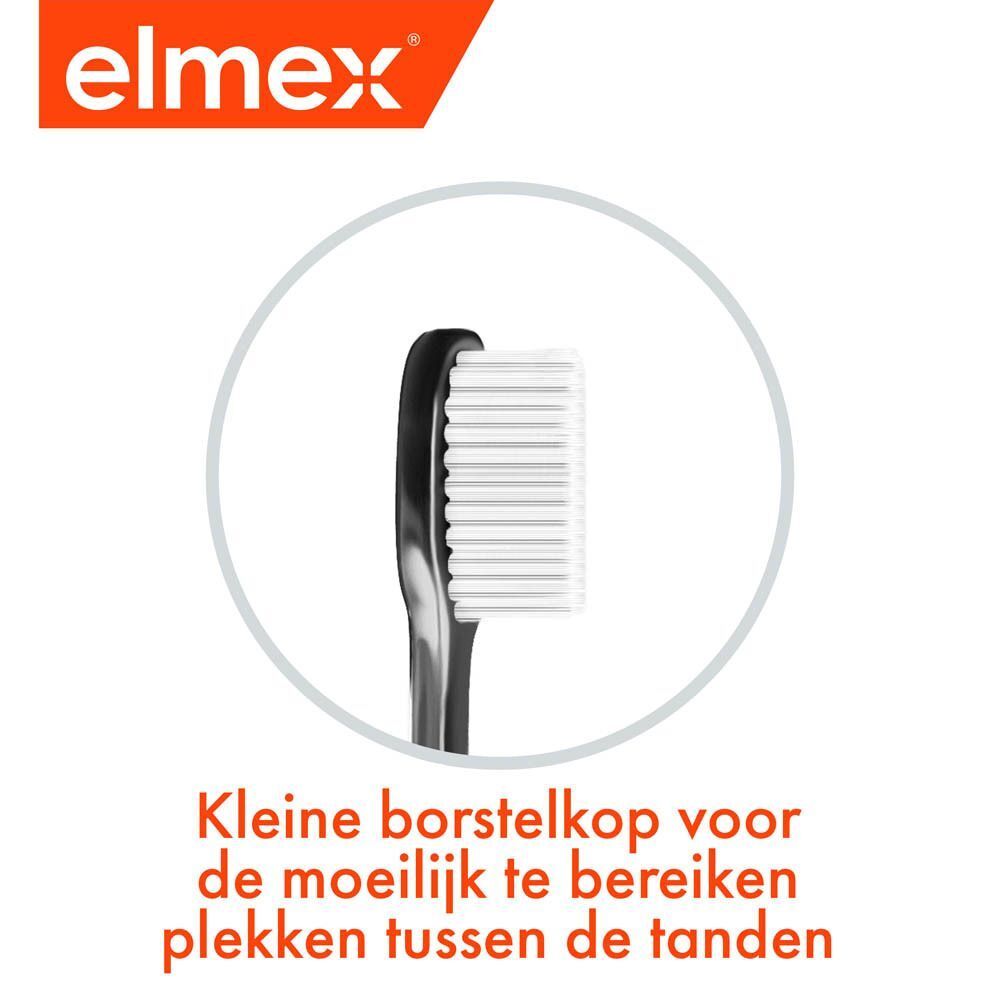 Close-up van de borstelkop. Compacte kop, witte borstelharen, zwarte handgreep. Tekst: Kleine borstelkop.