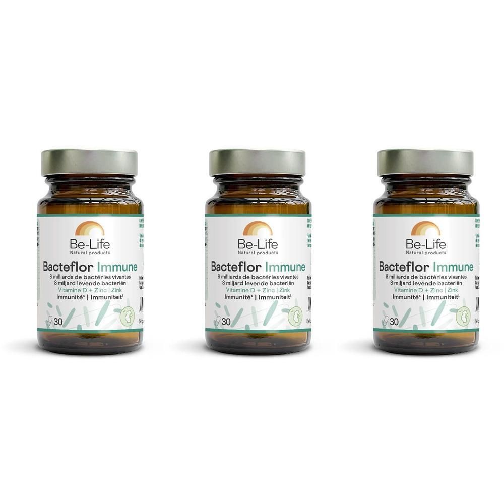 Trois flacons de Be-Life Bacteflor Immune. Flacons en verre brun avec couvercles argentés et étiquettes blanches.