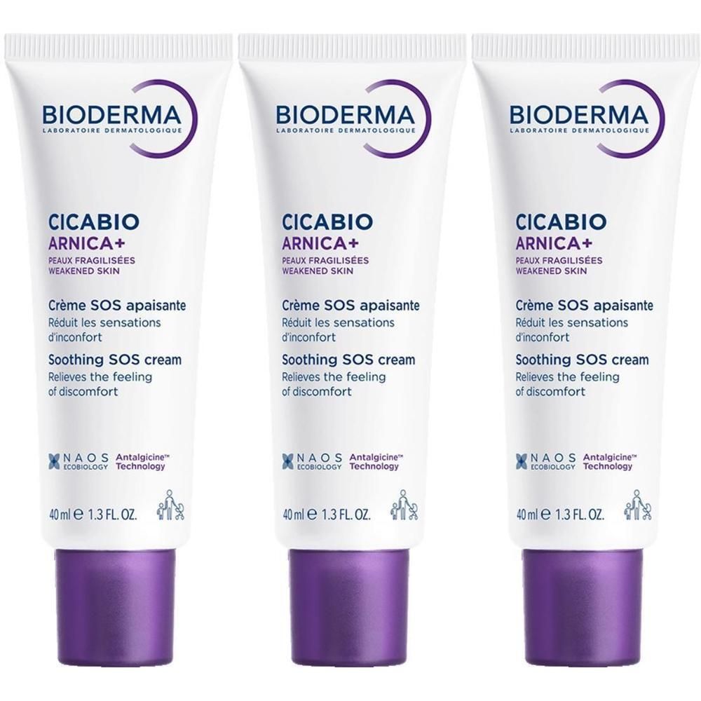 Trois tubes de crème blancs, bouchons violets. Inscription: Bioderma, Cicabio Arnica+, Crème SOS apaisante, Soothing SOS cream.