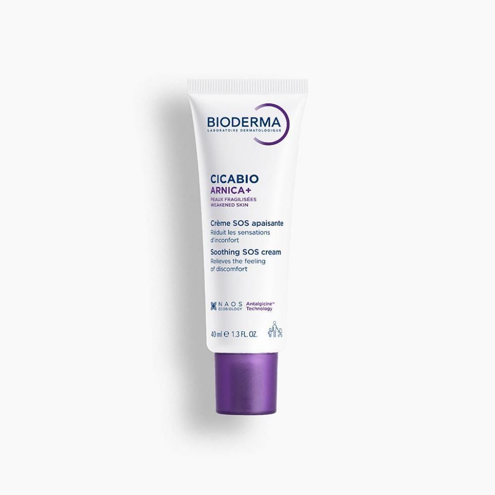 Un tube de crème. Blanc, bouchon violet. Inscription: Bioderma, Cicabio Arnica+, Crème SOS apaisante, Soothing SOS cream.