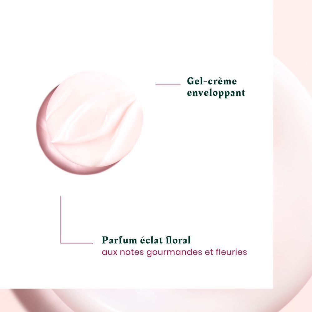 Gros plan d'une crème. Texte: Gel-crème enveloppant et parfum éclat floral aux notes gourmandes et fleuries.