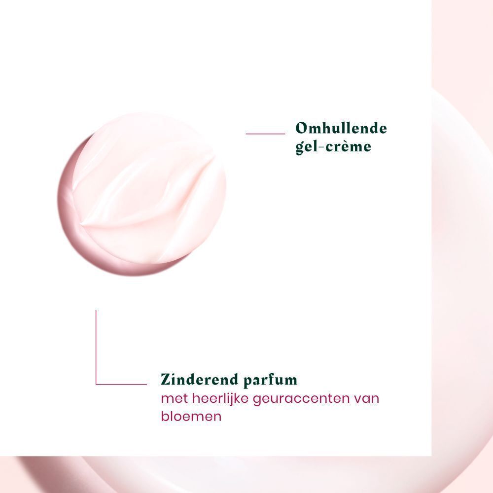 Close-up van een crème. Tekst: Omhullende gel-crème en geur met heerlijke geuraccenten van bloemen.