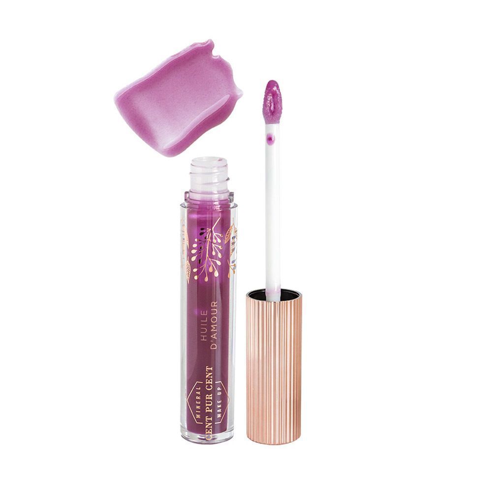 Lip Oil fles met open applicator en kleurstaal. Op de fles staat "Cent Pur Cent" en "Huile d'Amour".