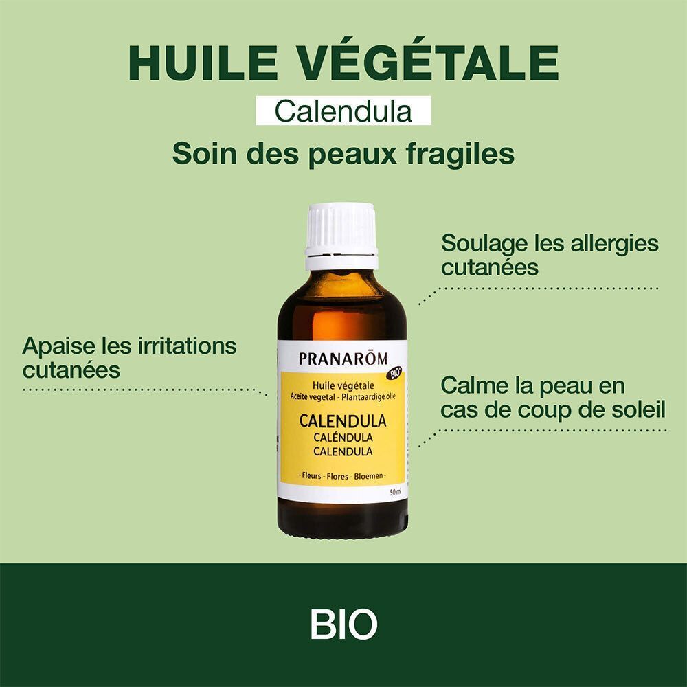 Plusieurs flacons d'huile de Calendula avec emballage. Inscription: Pranarôm, Calendula.