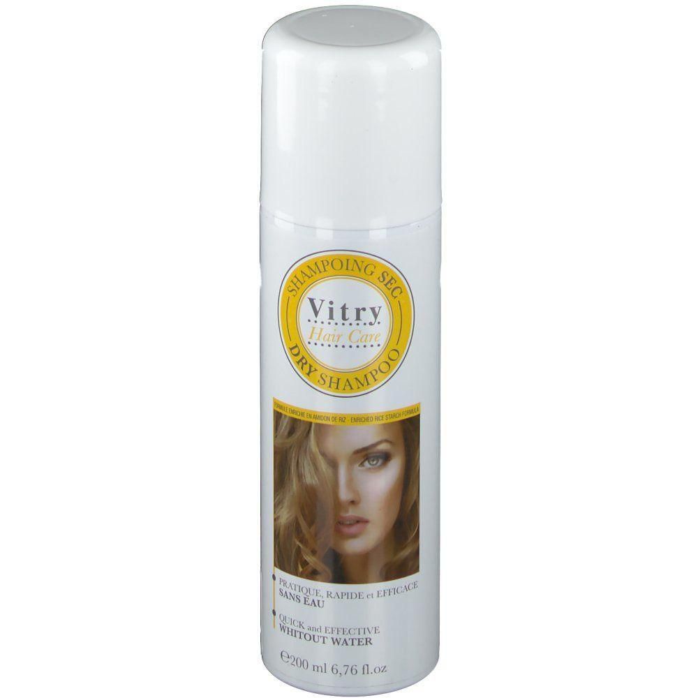 Flacon de shampooing sec blanc avec étiquette jaune. Marque Vitry. Image d'une femme. Texte: Quick and effective without water.