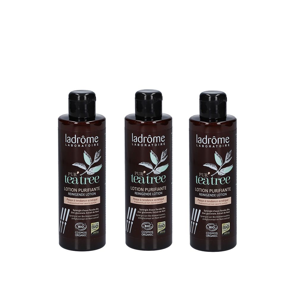 Trois flacons de Ladrôme Tea Tree Lotion Purifiante Bio. Flacons bruns avec bouchon noir. Inscription : Tea Tree, Lotion Purifiante.