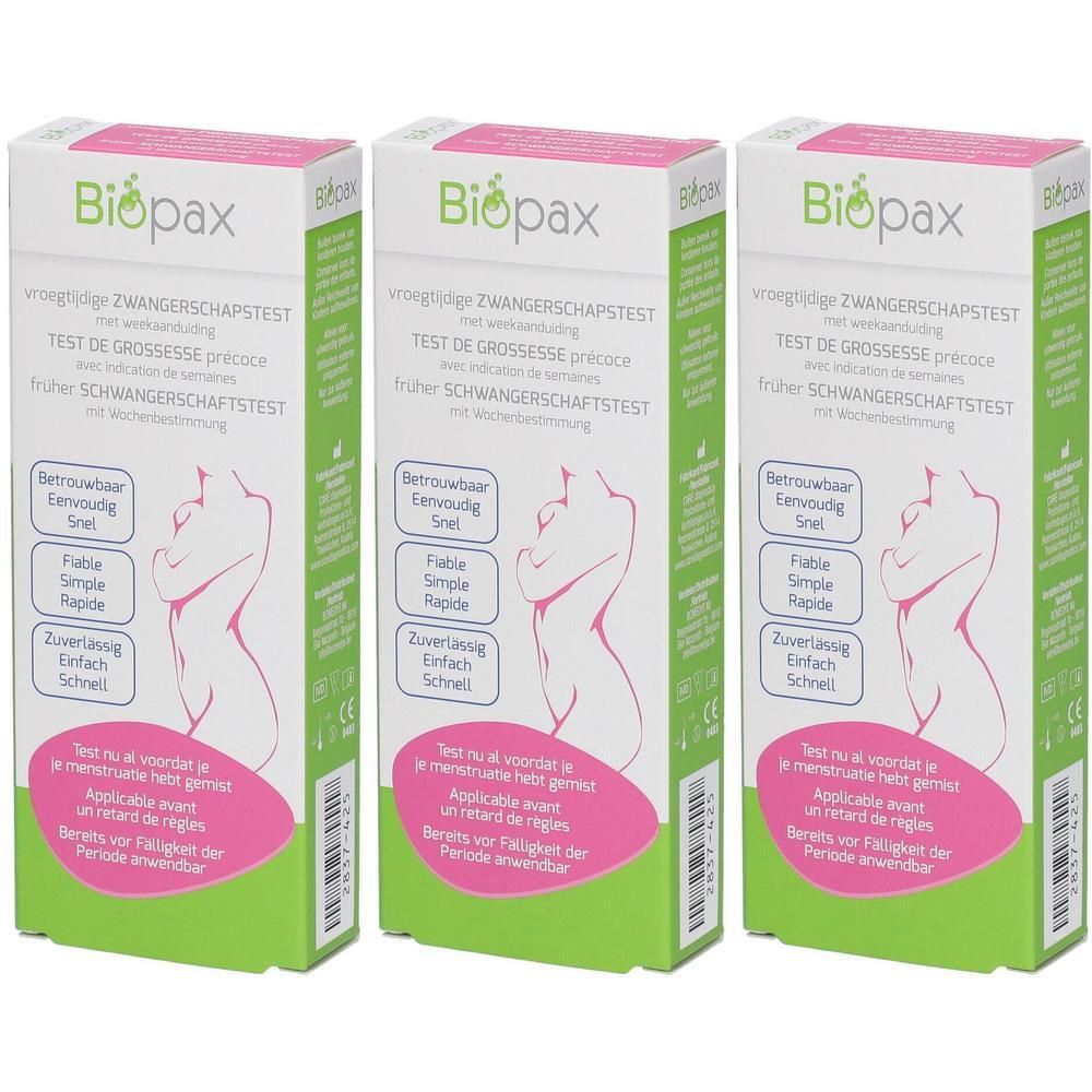 Trois boîtes de tests de grossesse. Marque Biopax. Texte: Test de Grossesse Précoce. Emballage rose et vert.