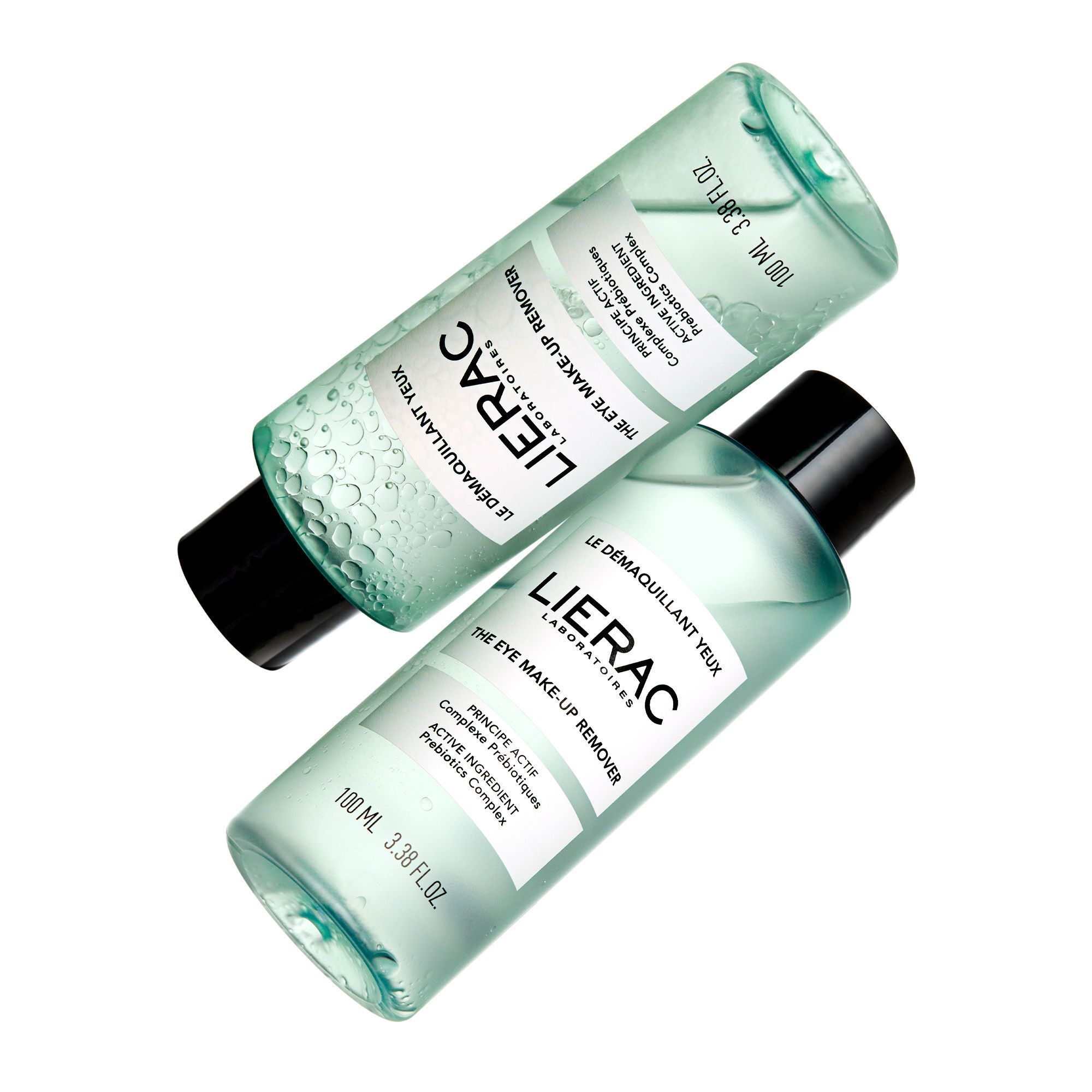 Deux flacons verts avec bouchon noir. Inscription : Lierac, Le Démaquillant Yeux, The Eye Make-up Remover. 100 ml.