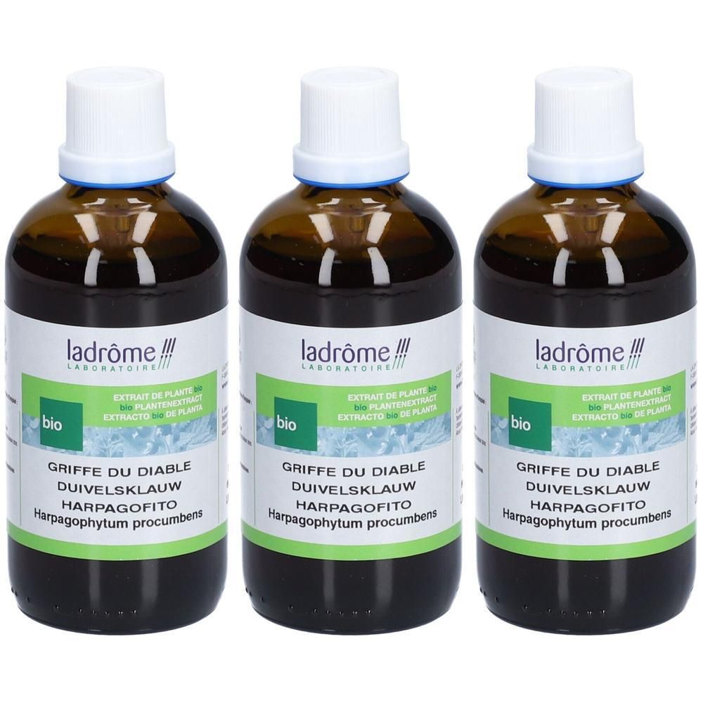 Drie bruine glazen flessen met witte doppen. Labels met tekst: Griffe du Diable, Harpagofito. Merk: Ladrôme.
