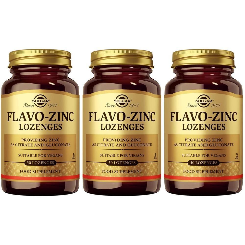 Trois flacons de Solgar Flavo-Zinc Lozenges. Flacons en verre brun avec couvercles et étiquettes dorés. Inscription : Flavo-Zinc Lozenges.