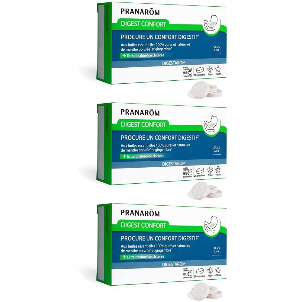 Trois boîtes de Pranarôm Digestarom Digest Confort. Comprimés blancs à côté. Emballage vert et blanc.
