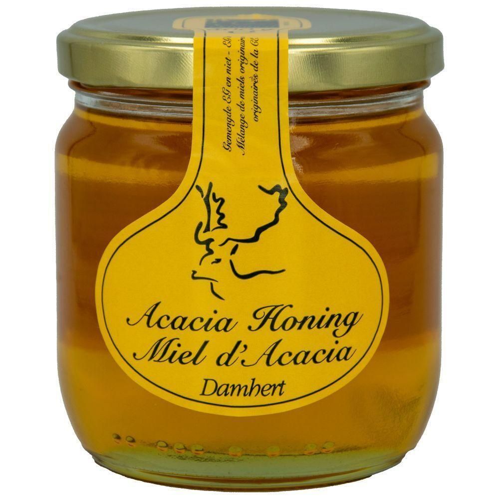 Pot de miel. Étiquette jaune avec texte 'Acacia Honing Miel d'Acacia Damhert'. Couvercle doré.