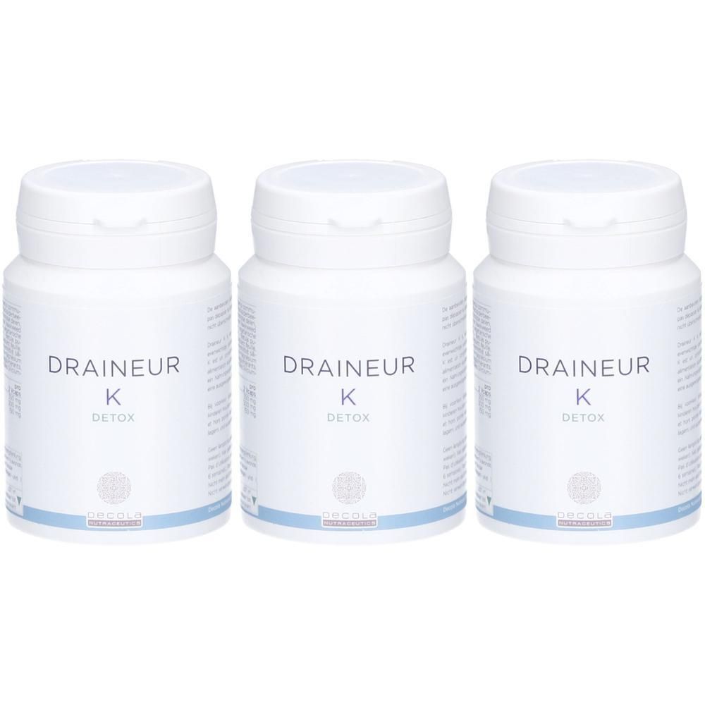 Trois flacons blancs avec couvercles. Chaque flacon porte l'inscription "Draineur K Detox" et un logo en dessous.
