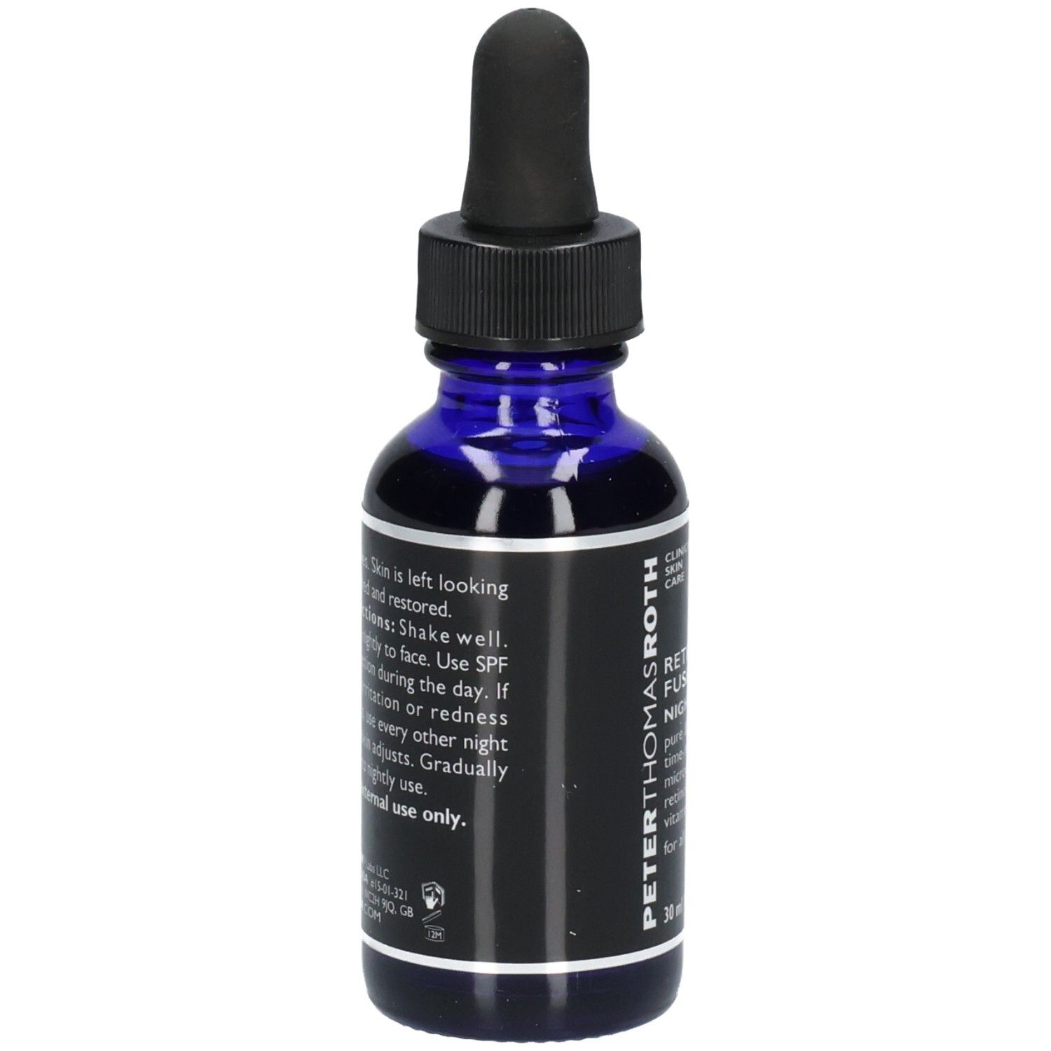 Achterkant van de Peter Thomas Roth Retinol Fusion PM Nachtserum fles met gebruiksinstructies en ingrediënten.