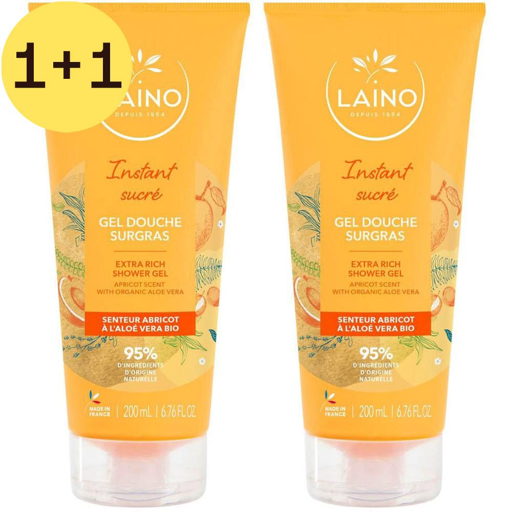 Twee tubes douchegel op gele achtergrond. Opschrift: Laino, Instant sucré, Gel Douche Surgras, Senteur Abricot à l'Aloe Vera Bio.