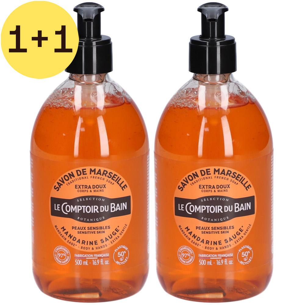 Deux flacons de savon liquide Mandarine Sauge. Bouchon pompe noir, liquide orangé. Inscription: Le Comptoir du Bain. Offre 1+1.