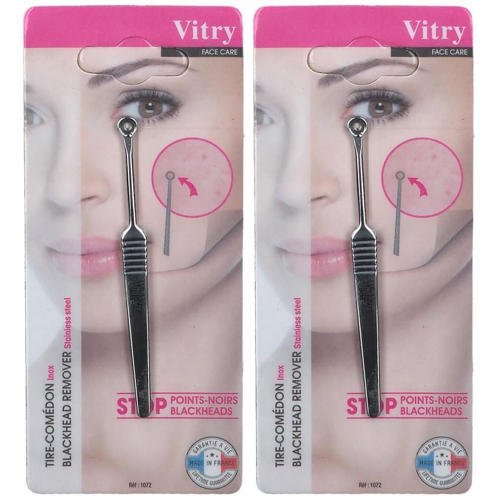 Deux extracteurs de points noirs en acier inoxydable sous blister. Manche strié et boucle pour retirer les points noirs.
