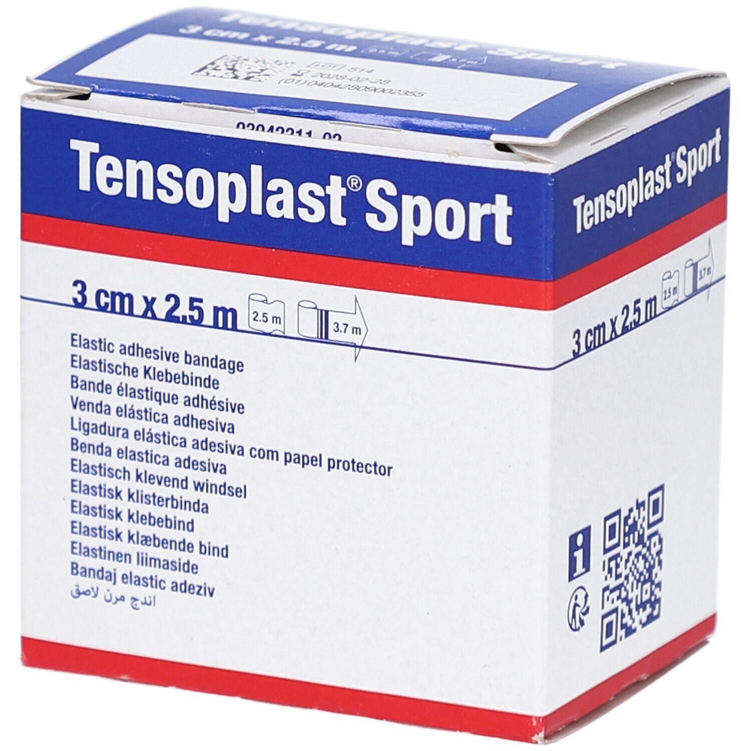 Boîte de Tensoplast Sport. Inscription : 3 cm x 2,5 m. Bande adhésive élastique. Emballage bleu et blanc avec nom et taille du produit.