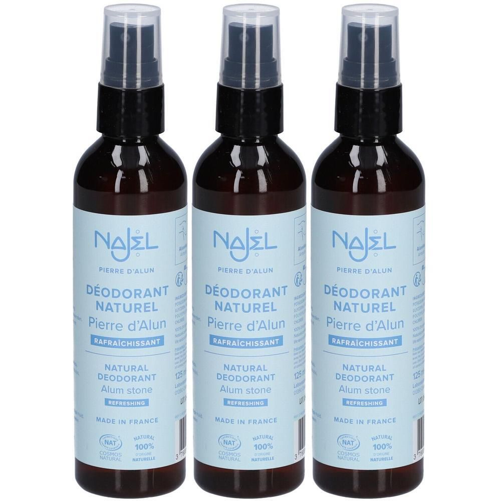 Trois flacons de déodorant NAJEL Pierre d'Alun Spray avec tête de pulvérisation. Flacons en verre brun avec étiquette bleue.