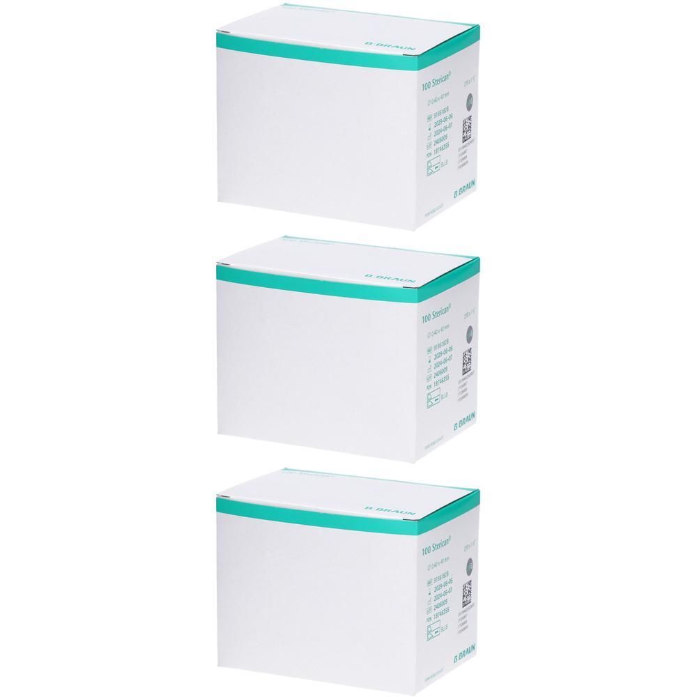 Trois boîtes blanches avec des accents verts, empilées.