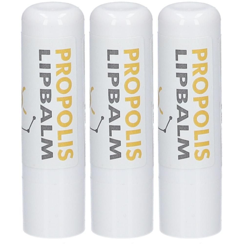 Drie witte lippenbalsemstiften met de tekst "PROPOLIS LIPBALM".