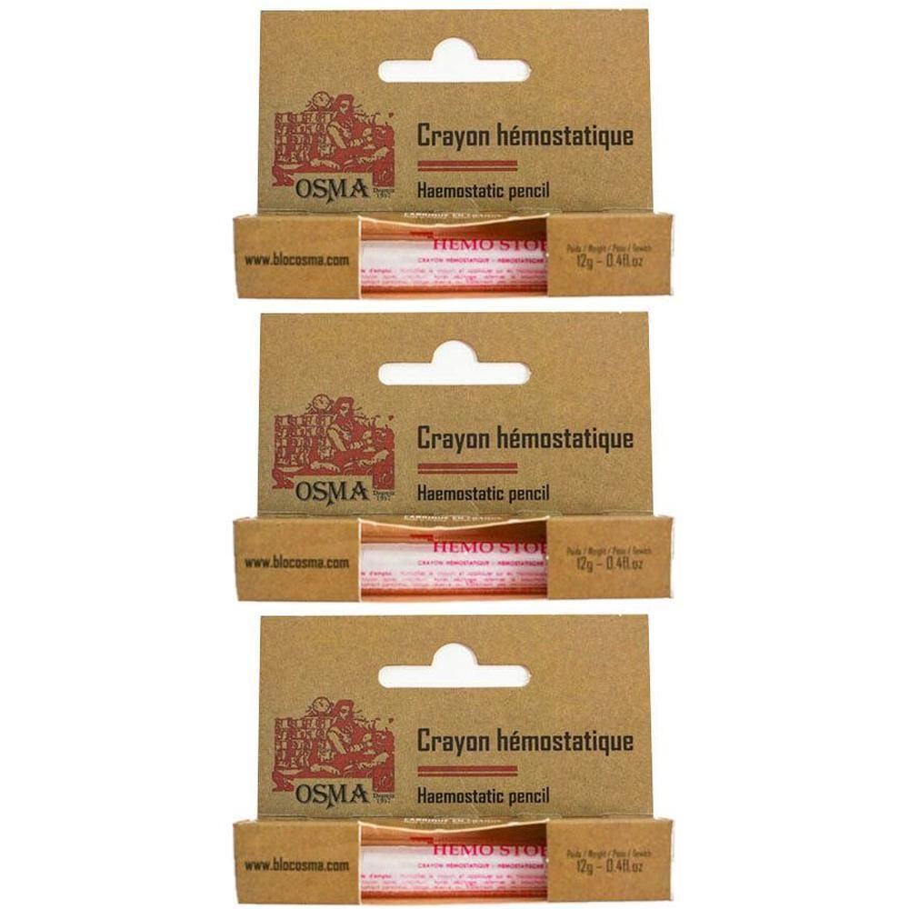 Drie Osma Hemo-Stop Hemostatische potloden in kartonnen verpakking. Elke potlood is wit met rode belettering.