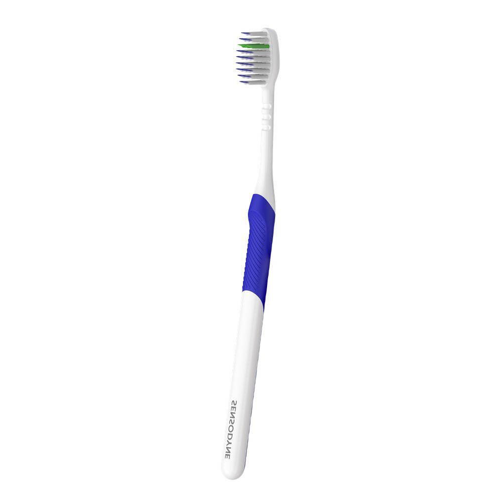 Une brosse à dents Sensodyne Deep Clean Extra Soft avec manche blanc et insert bleu.